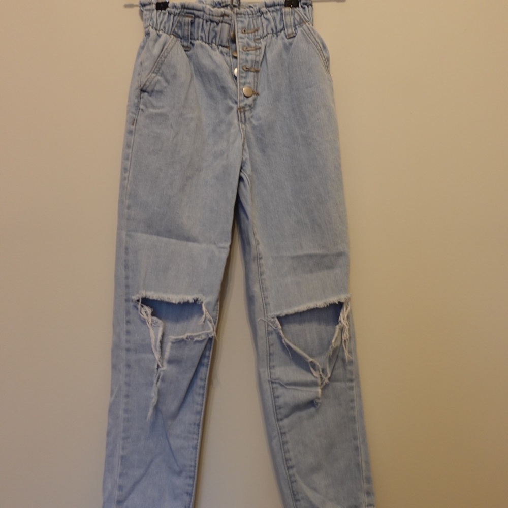 Super Cute kids jeans , how ever does have a rip that happened on the knee